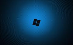 Windows seven fond ecran windows 7 ombre logo sur fond bleu lignes bleus sombres.