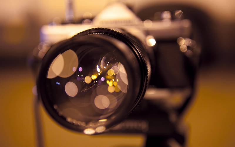 Fond ecran appareil photo focus objectif image fond flou couleurs teintes chaudes